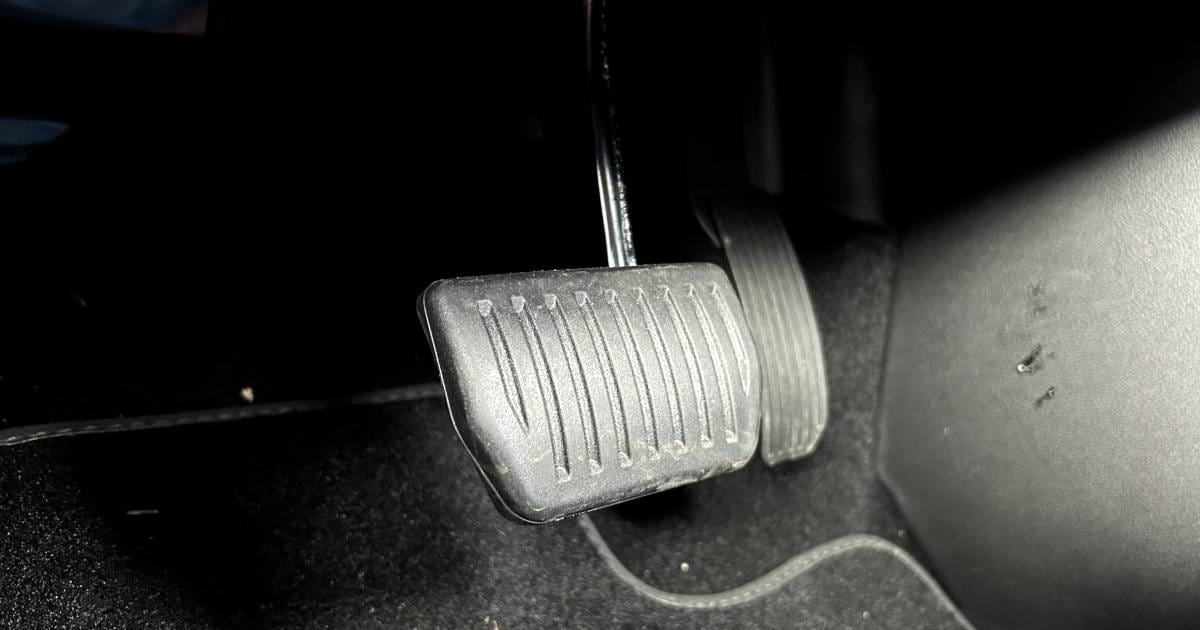 The pedals in the Ora 03, showing the brake pedal sitting much higher than accelerator