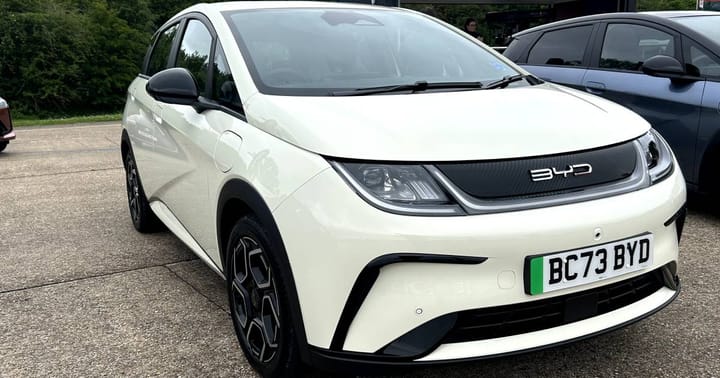 A white BYD Dolphin electric car