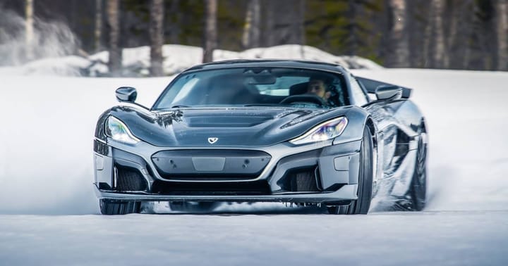 A Rimac Nevera electric supercar being driven in the snow